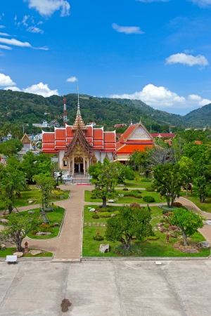 Beautiful park of  Buddhist temple on  background of blue sky, Thailand.の写真素材