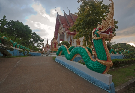 Beautiful Buddhist temple on  background of blue sky, Thailand の写真素材