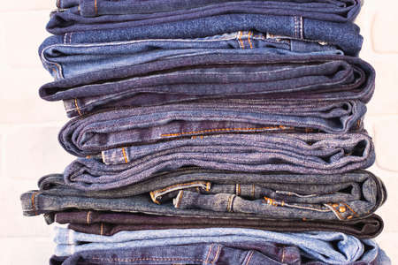Stack of jeans close up. Soft focus.の写真素材