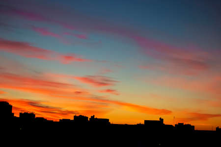 Bright colorful sunset in the urban landscape.の写真素材