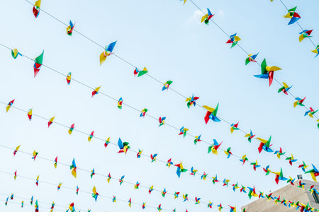 Color windmill hanging in the sky