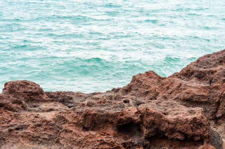 The waves and rocks at the seaの写真素材