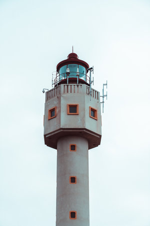 A lighthouse high up in the skyの写真素材