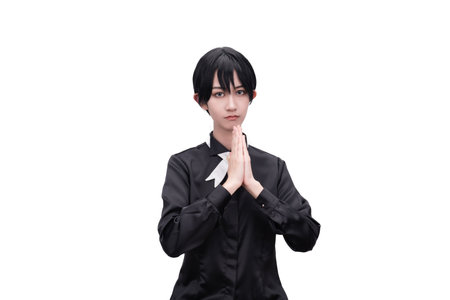 A girl with short hair dressed in blackの写真素材