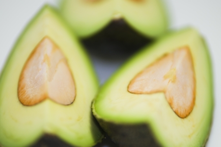 cut avocado on white background , tropical fruitの写真素材
