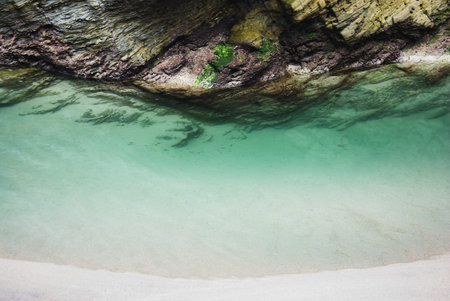 Sand and rocks on a beach in Galicia , Atlantic Ocean, Spain