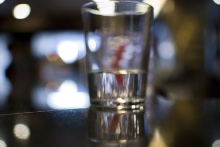 glass background defocused lights flashing and abstractの写真素材