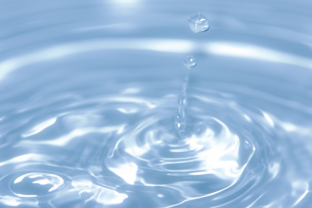 studio shot of water drops in blue toneの写真素材