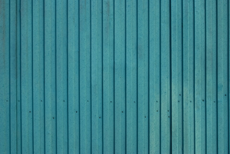 green metal surface with vertical lines, backgroundの写真素材