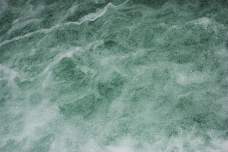 waterfall formed in the course of a riverの写真素材