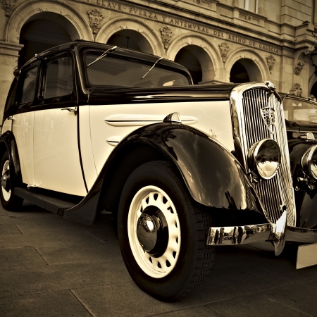 antique car parked outside, sepia toned pictureのeditorial素材