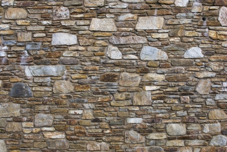 stone wall with different shapes and colorsの写真素材