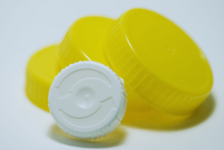 Plastic plugs yellow and white on white background, isolatedの写真素材