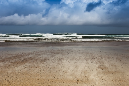 landscape lonely beach day with cloudy skyの写真素材