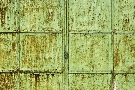 green metal surface with vertical and horizontal linesの写真素材