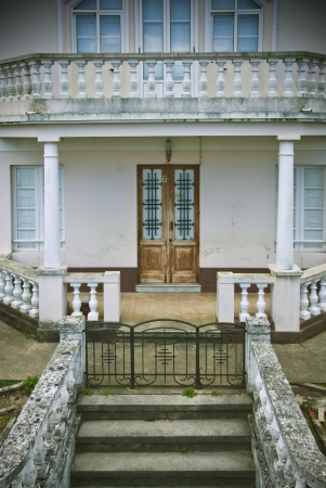 building facade with wooden door and balconyのeditorial素材