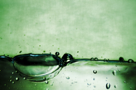 abstract background water bubbles in greenの写真素材
