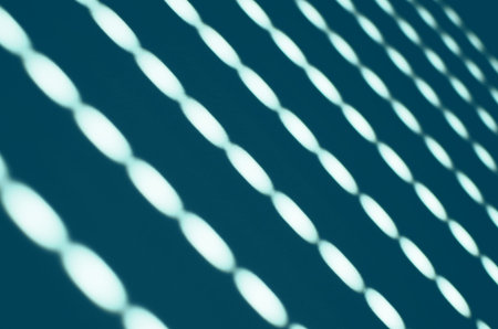 white lights on the wall, symmetrical forms