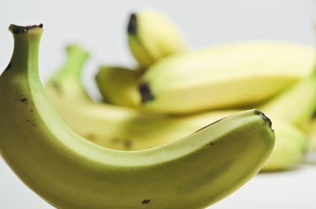 A bunch of organic and yellow bananasの写真素材