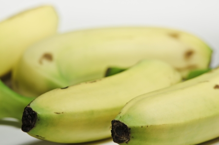 A bunch of organic and yellow bananasの写真素材