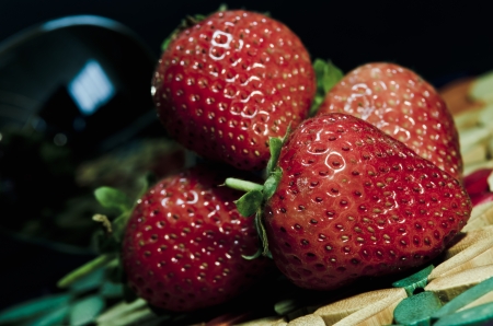 Closeup of Fresh Organic Homegrown Strawberries, succulent fruit.の写真素材