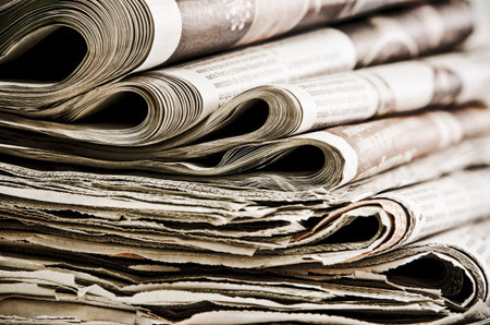 closeup of newspaper on white background
