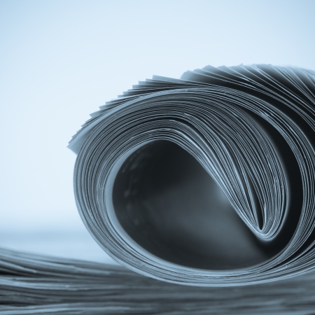 Closeup of rolls of newspapers with shallow depth of fieldの写真素材