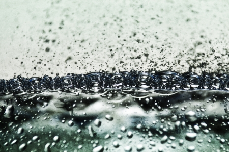 abstract background water bubbles in greenの写真素材