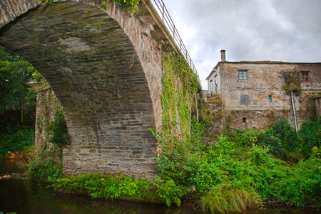 stone bridge over a river in Galicia   Spain  