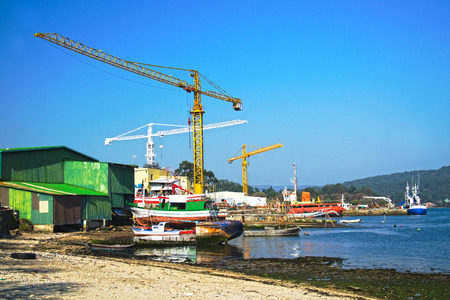 shipyard fishing boats on the coast of Galiciaの写真素材