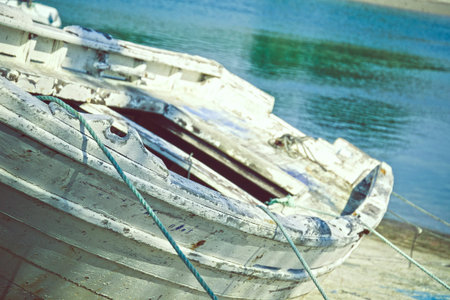 small boat in a harbor off the coast of Galiciaの写真素材