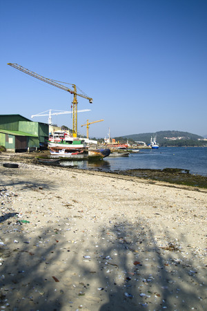 shipyard fishing boats on the coast of Galiciaの写真素材