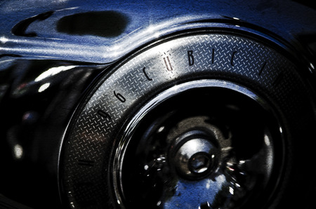 Close up of exhaust pipes and other motor parts of a Motorbike の写真素材