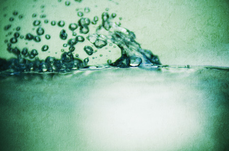 abstract background water bubbles in greenの写真素材