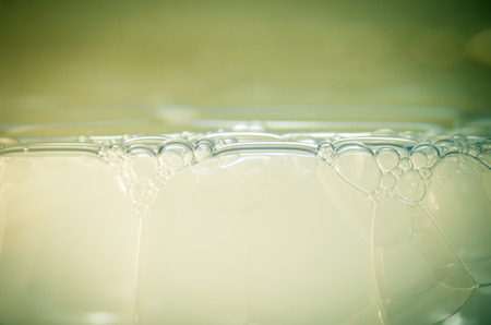 abstract background water bubbles in greenの写真素材