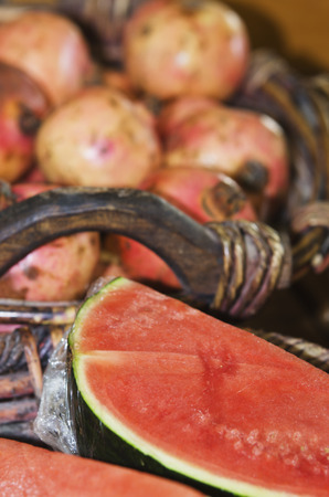 Colourful fruit and vegetable market stall in a rustic displayの写真素材