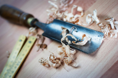 Old carpentry tools on a wooden table