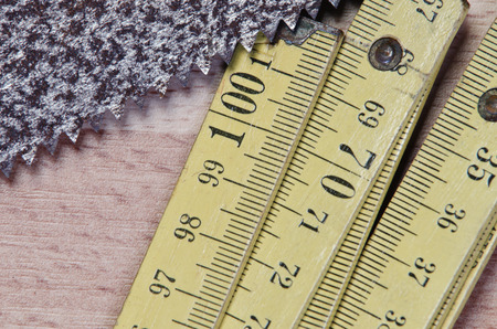 Old carpentry tools on a wooden tableの写真素材