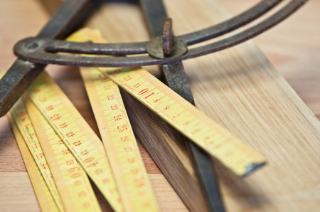 Old meter of carpenter in the workshop