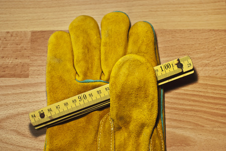 Old carpentry tools on a wooden tableの写真素材