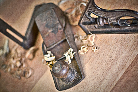 Old carpentry tools on a wooden table