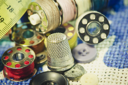 Old thread spools and thimbleの写真素材