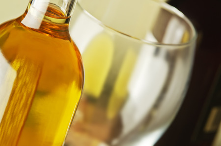 White and red wine bottles and glasses.の写真素材