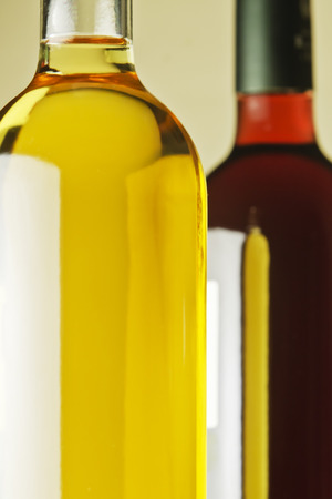 White and red wine bottles and glasses.の写真素材