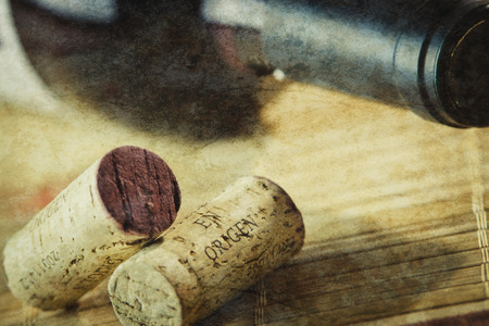 Bottle of red wine with a corkの写真素材