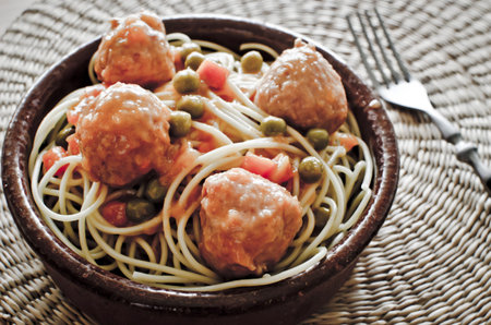 plate of spaghetti with meatballsの写真素材