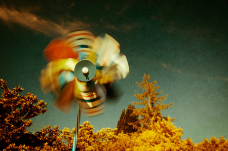 Coloured Wind Mill at sunset.の写真素材