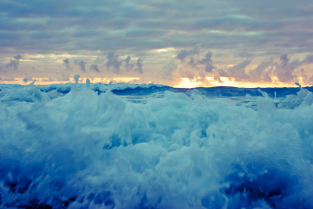 Abstract waves in coast at sunset