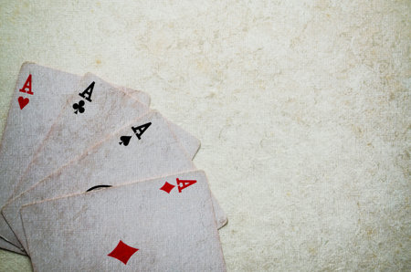 Four aces on a grunge background.の写真素材