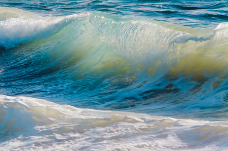 Splash wave on the beach.